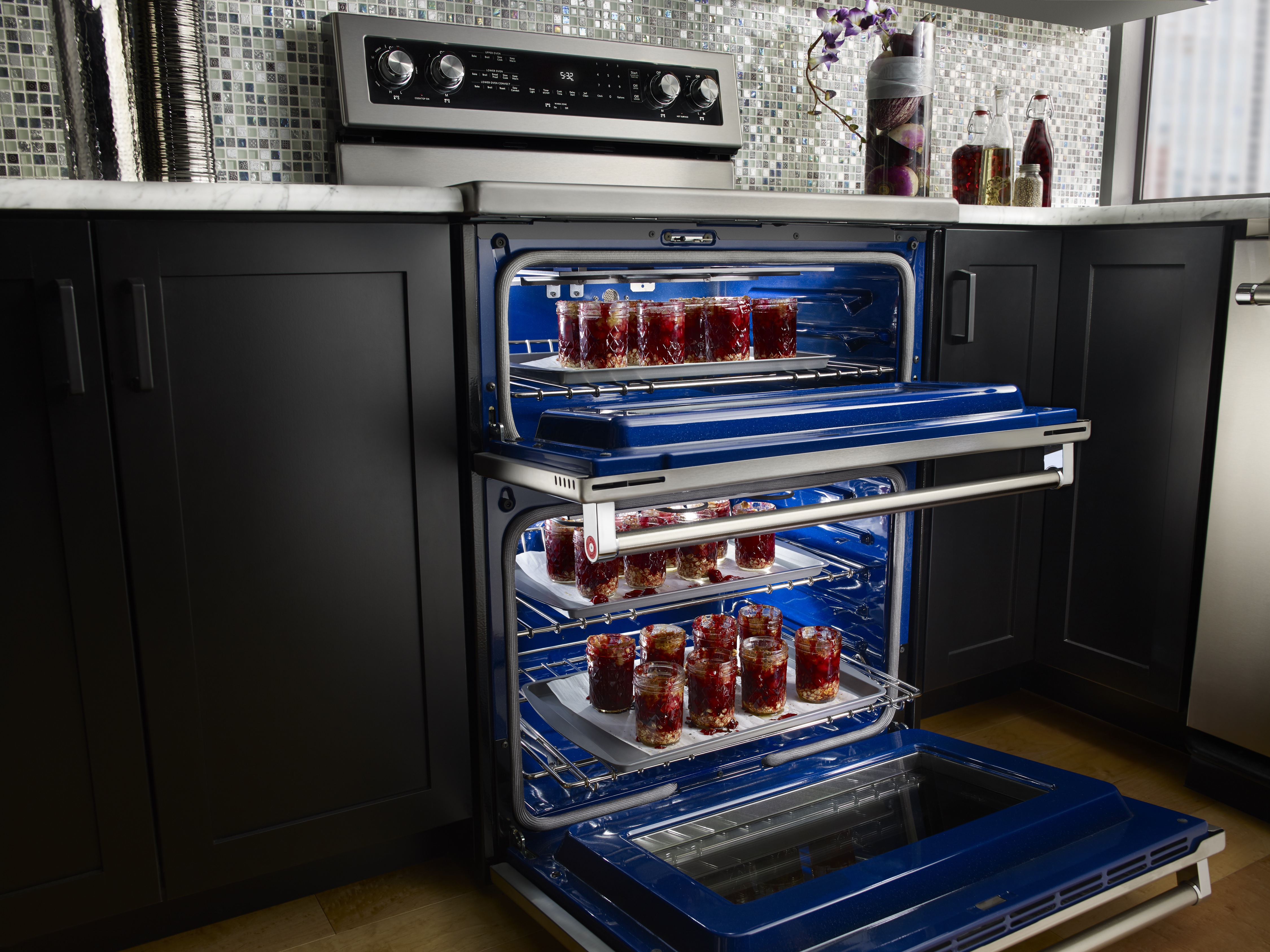 KitchenAid freestanding stainless steel electric range in modern kitchen