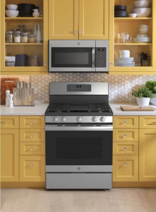 GE range in a kitchen with an over the range microwave