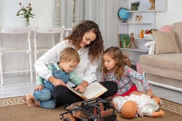 Young family sitting on the floor together