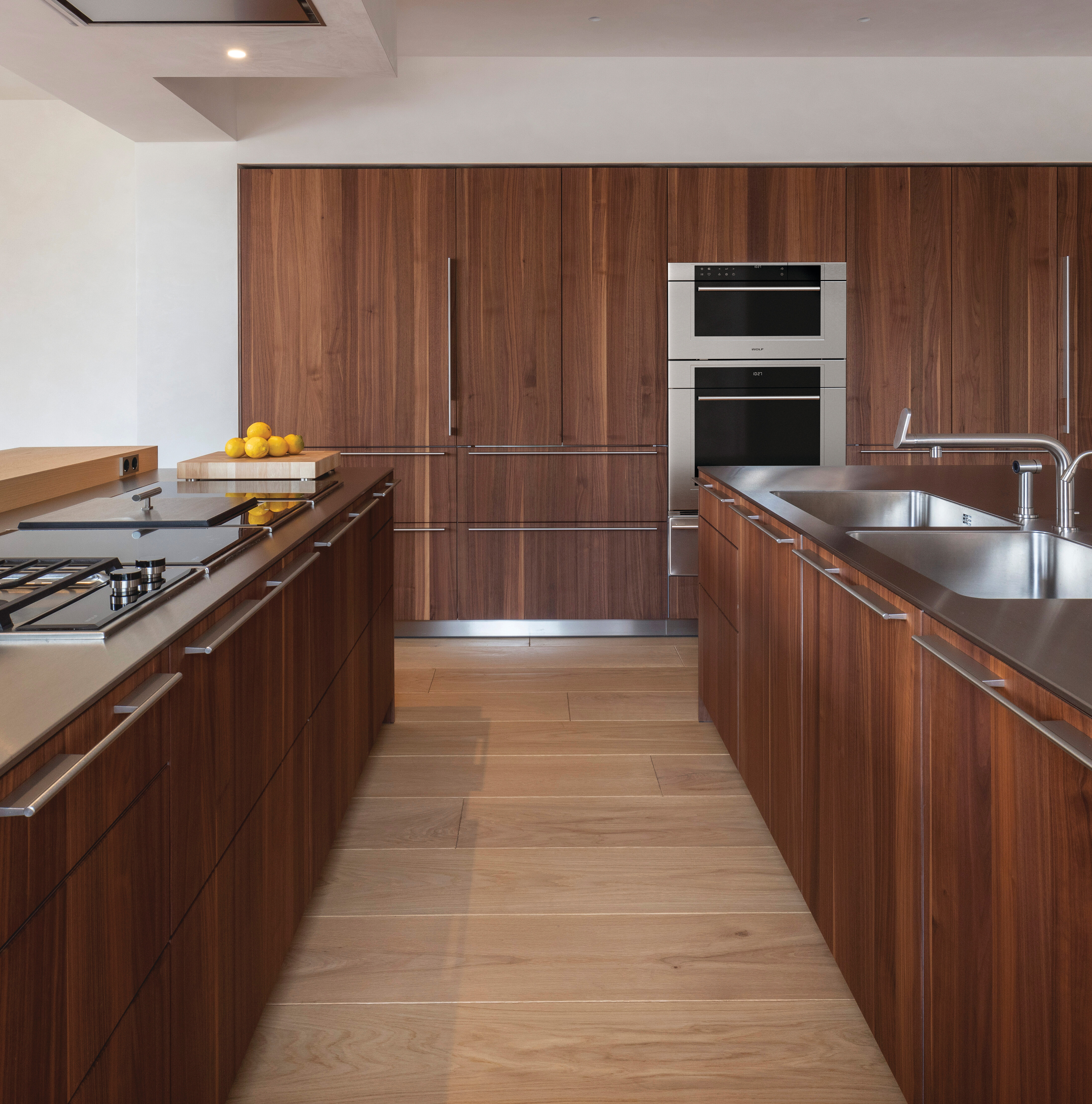 closed Intl Frigo Vicenza cabinets and triple-decker wall oven 