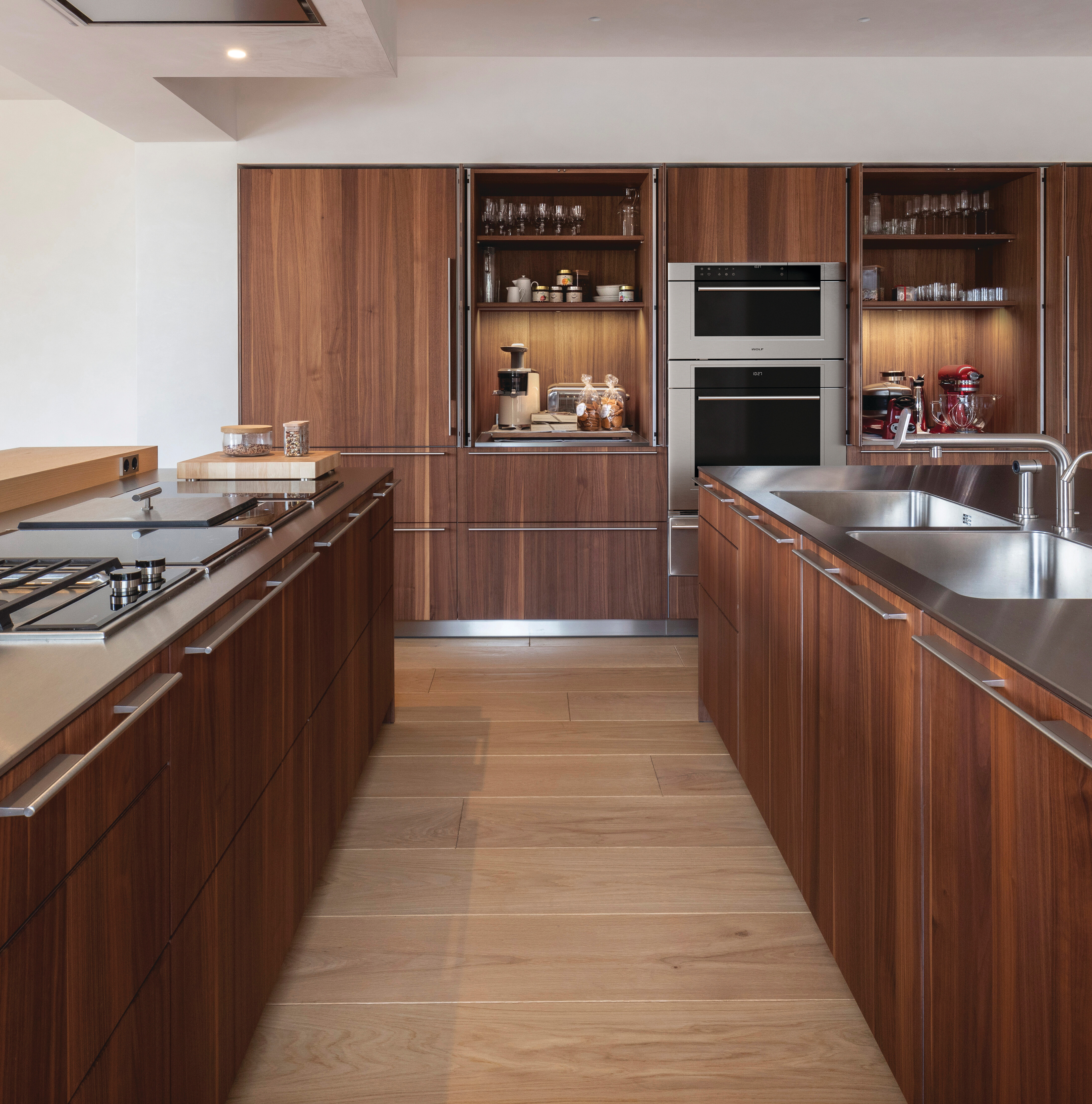 open Intl Frigo Vicenza cabinets and triple-decker wall oven
