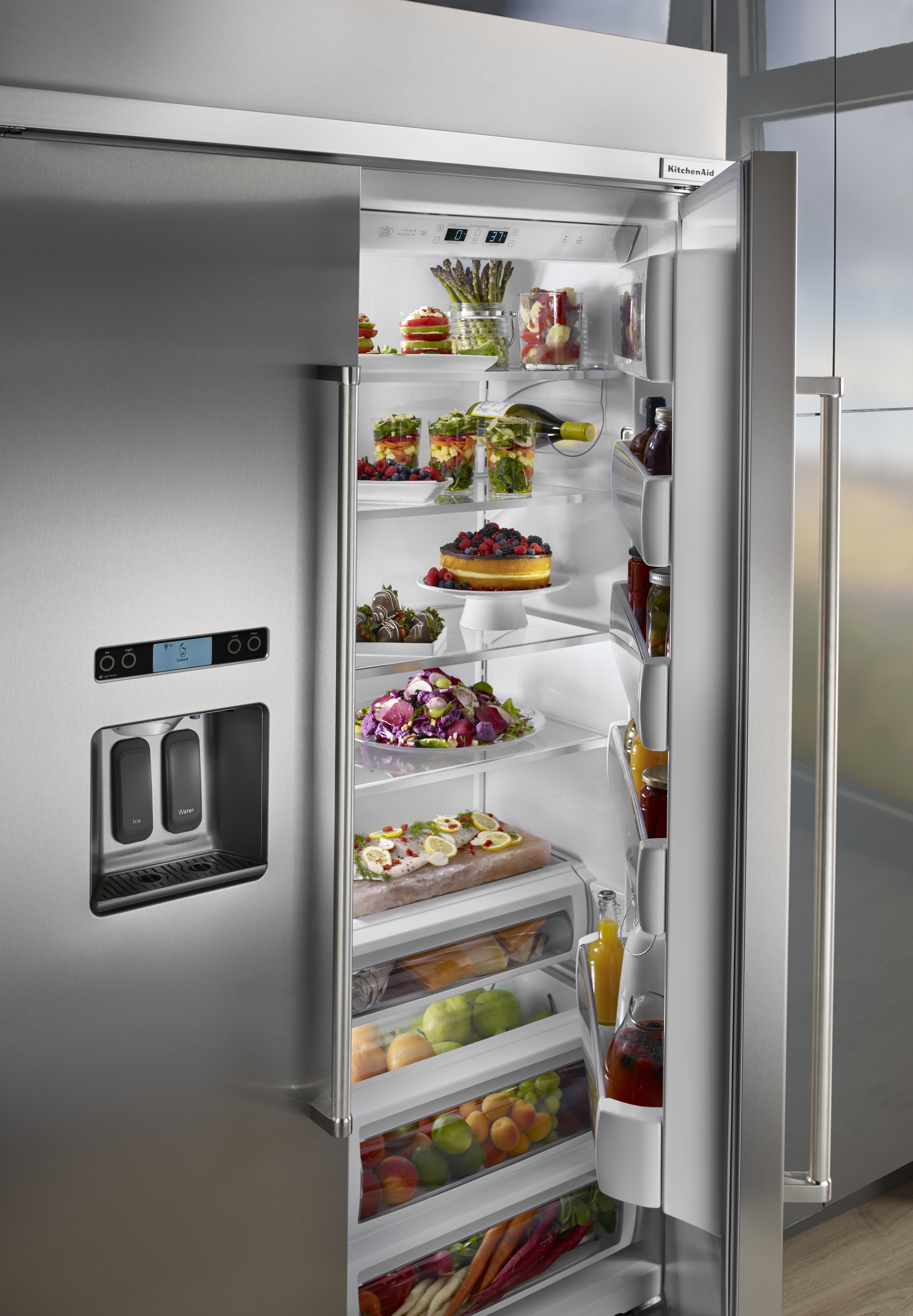 KitchenAid product image of KBSD618ESS professional side-by-side refrigerator with open door