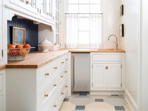 View of Artisan Signature Homes Monogram Southern kitchen butler’s pantry with Monogram built-in ice maker