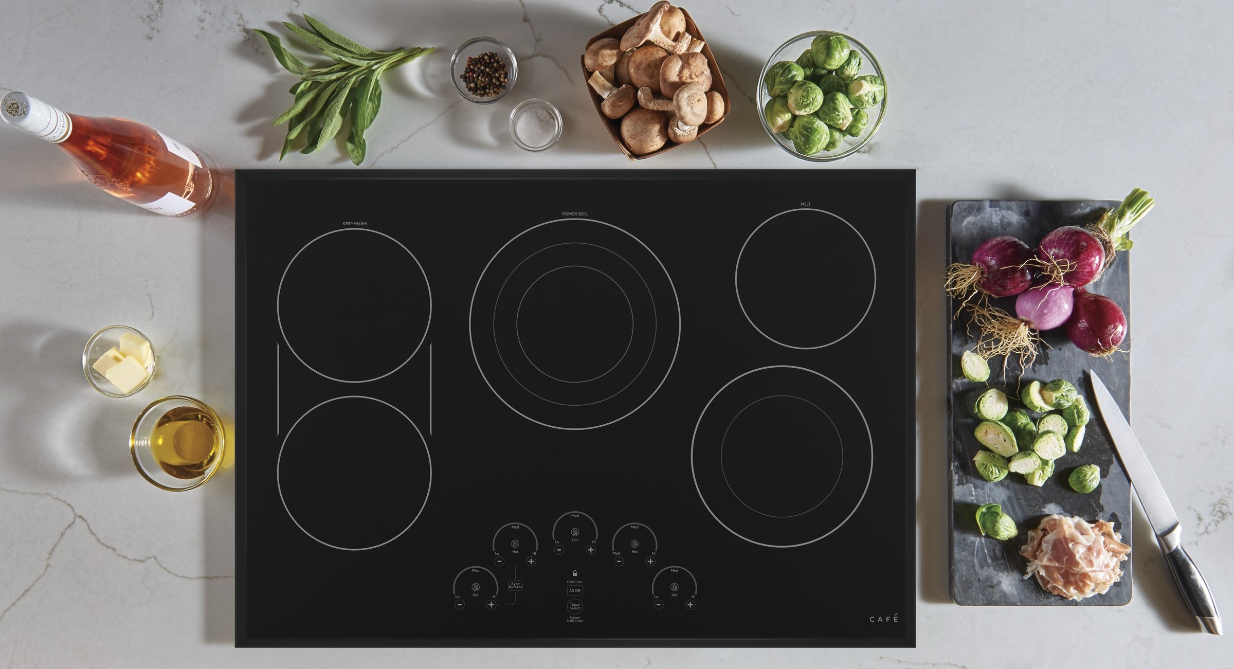product image of Cafe 30” Black Built In Electric Cooktop CEP90301NBB