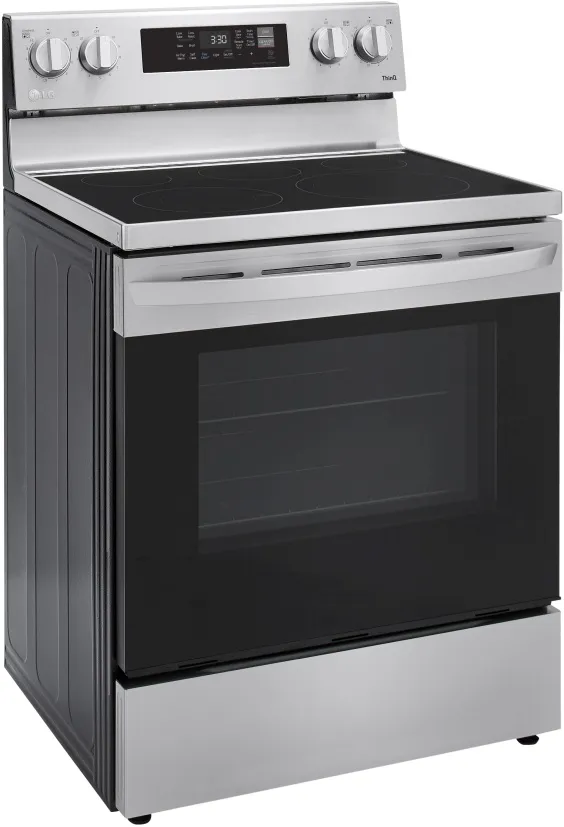 The GE GFE28GYNFS French door refrigerator in a kitchen with blue cabinets 