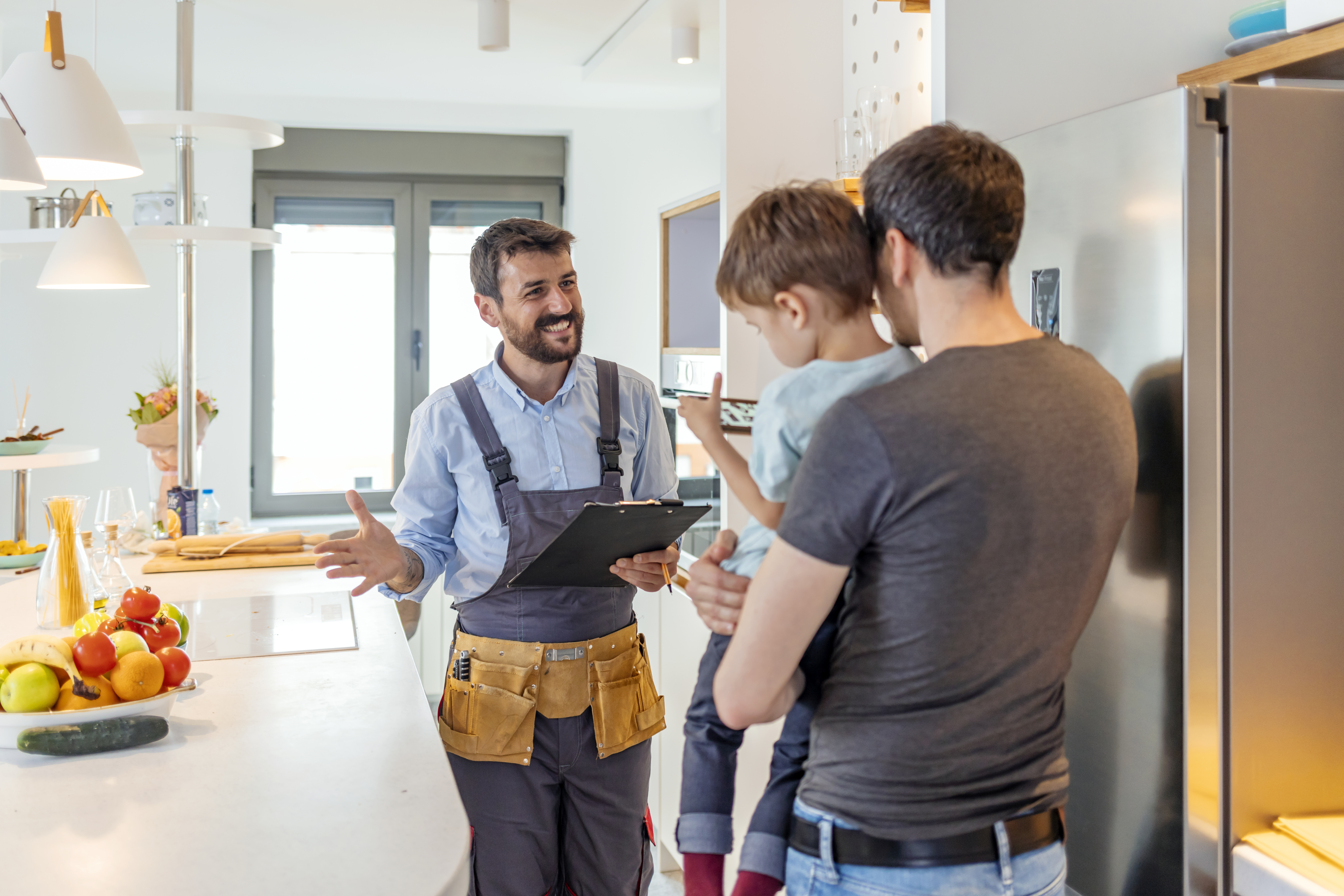 contractor and family having discussion in the kitchen