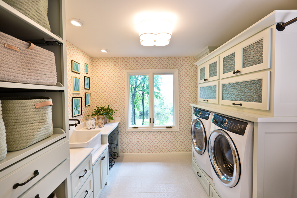 A laundry room with a washer and dryer