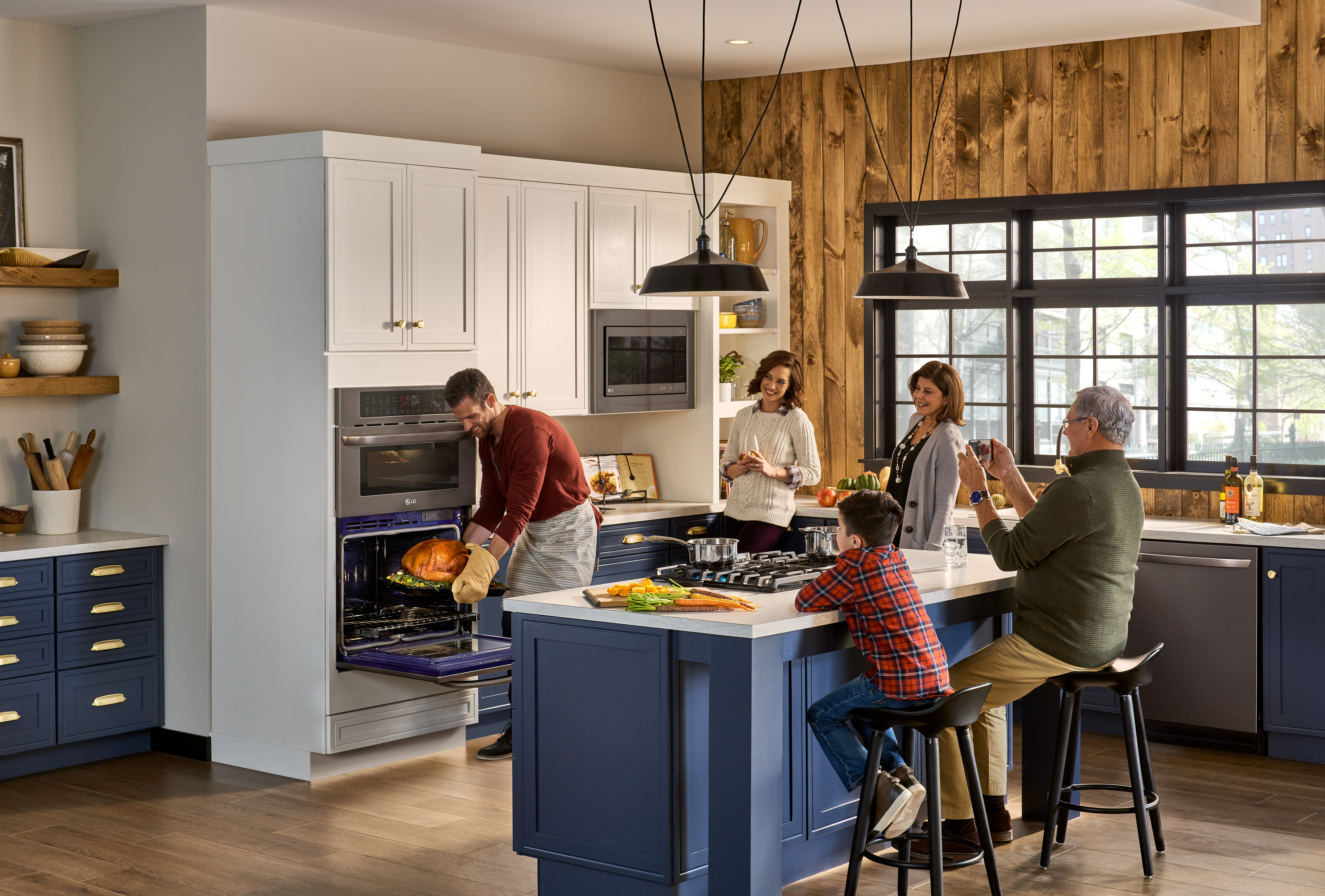 stainless steel LG appliance package in sunlit kitchen