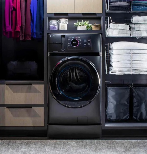 The GE Profile PFQ97HSPVDS UltraFast washer dryer combo in a high-end walk-in closet 