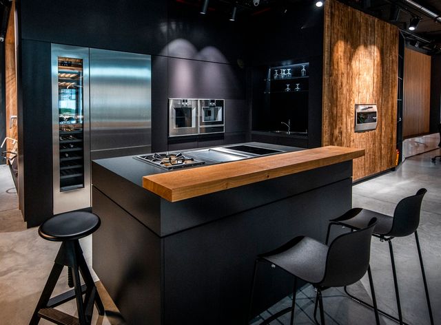 dark luxurious kitchen with high end appliances
