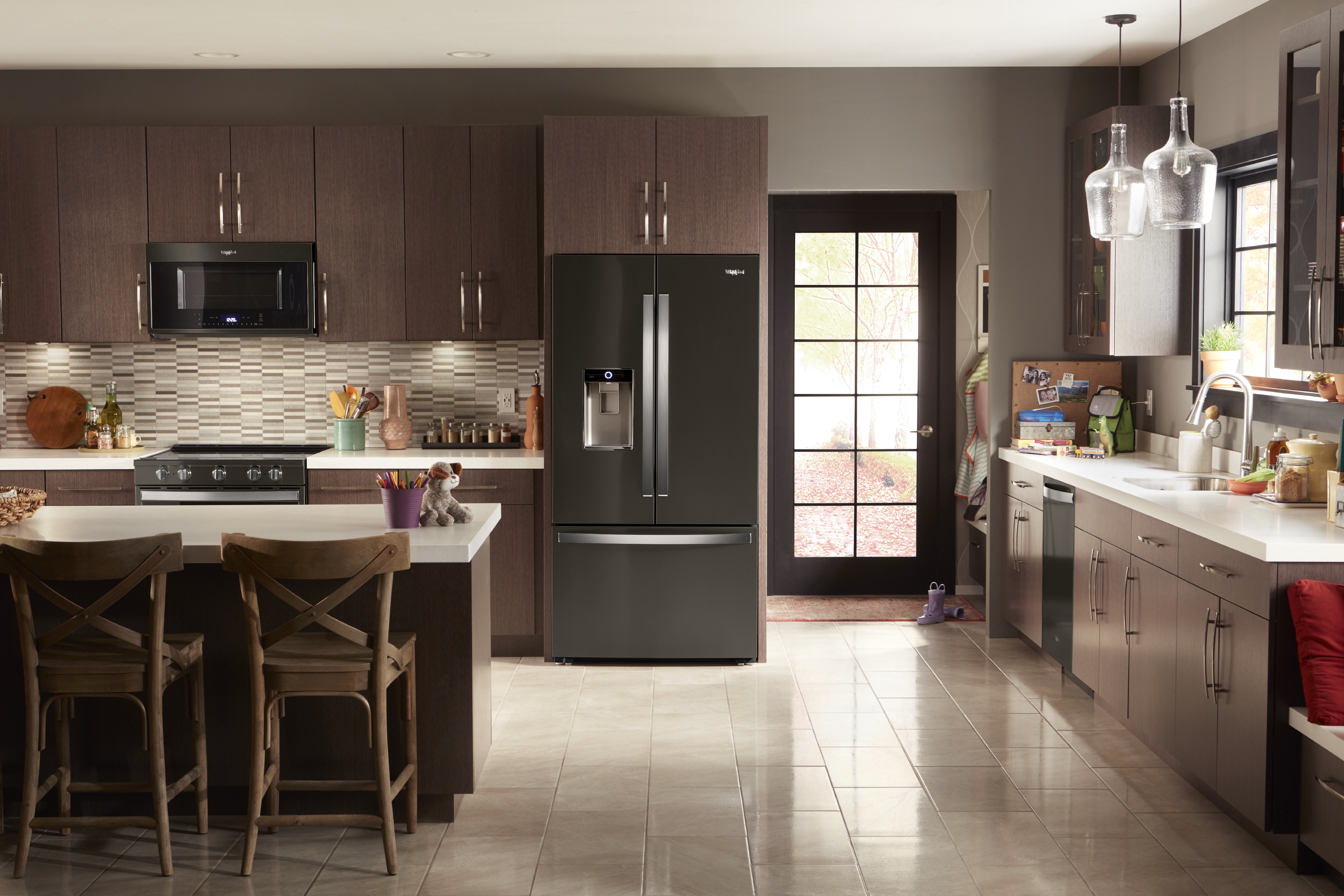 shot of kitchen with Whirlpool stainless-steel appliance package