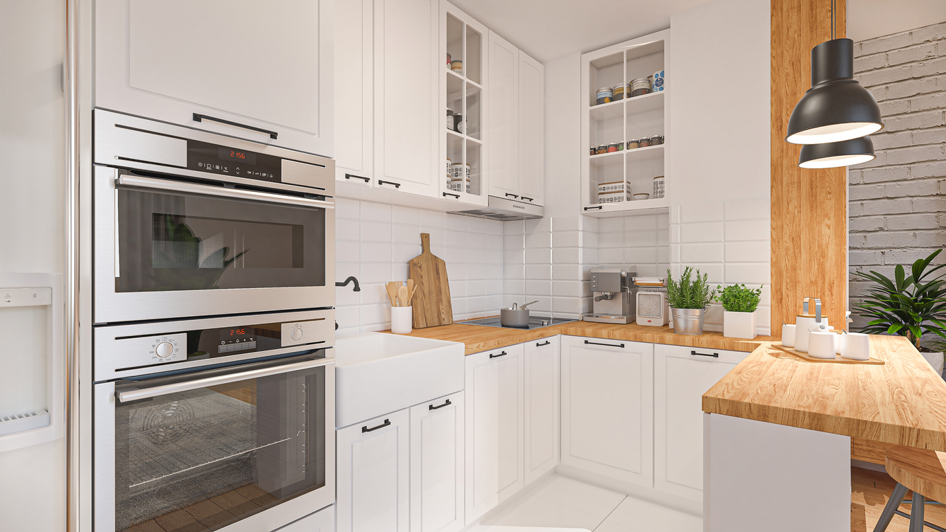 beautiful white domestic kitchen featuring microwave wall oven combo