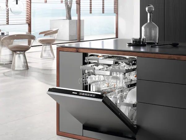 front view of a miele dishwasher in a luxury kitchen