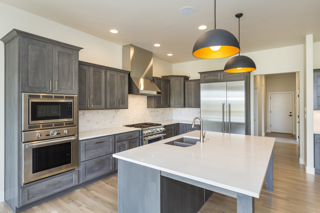 white kitchen with Maytag appliances