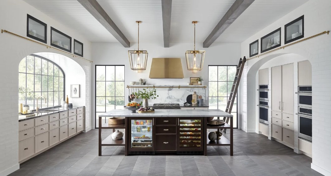Monogram refrigerator and ovens installed in a luxury farmhouse kitchen
