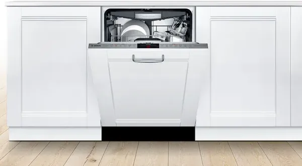 The Bosch 800 Series SHV878ZD3N panel ready dishwasher in a kitchen 