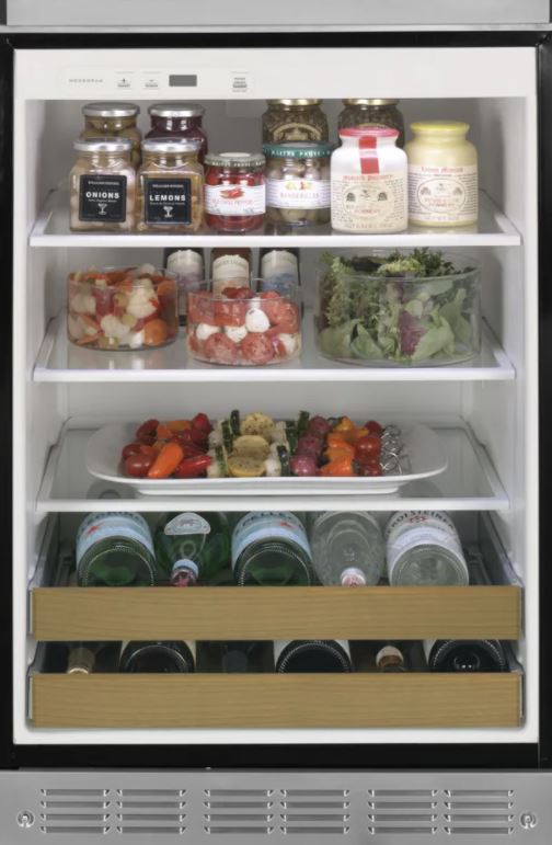 outdoor fridge stocked with water, appetizers, and dips
