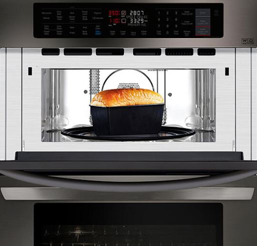microwave with baked bread inside