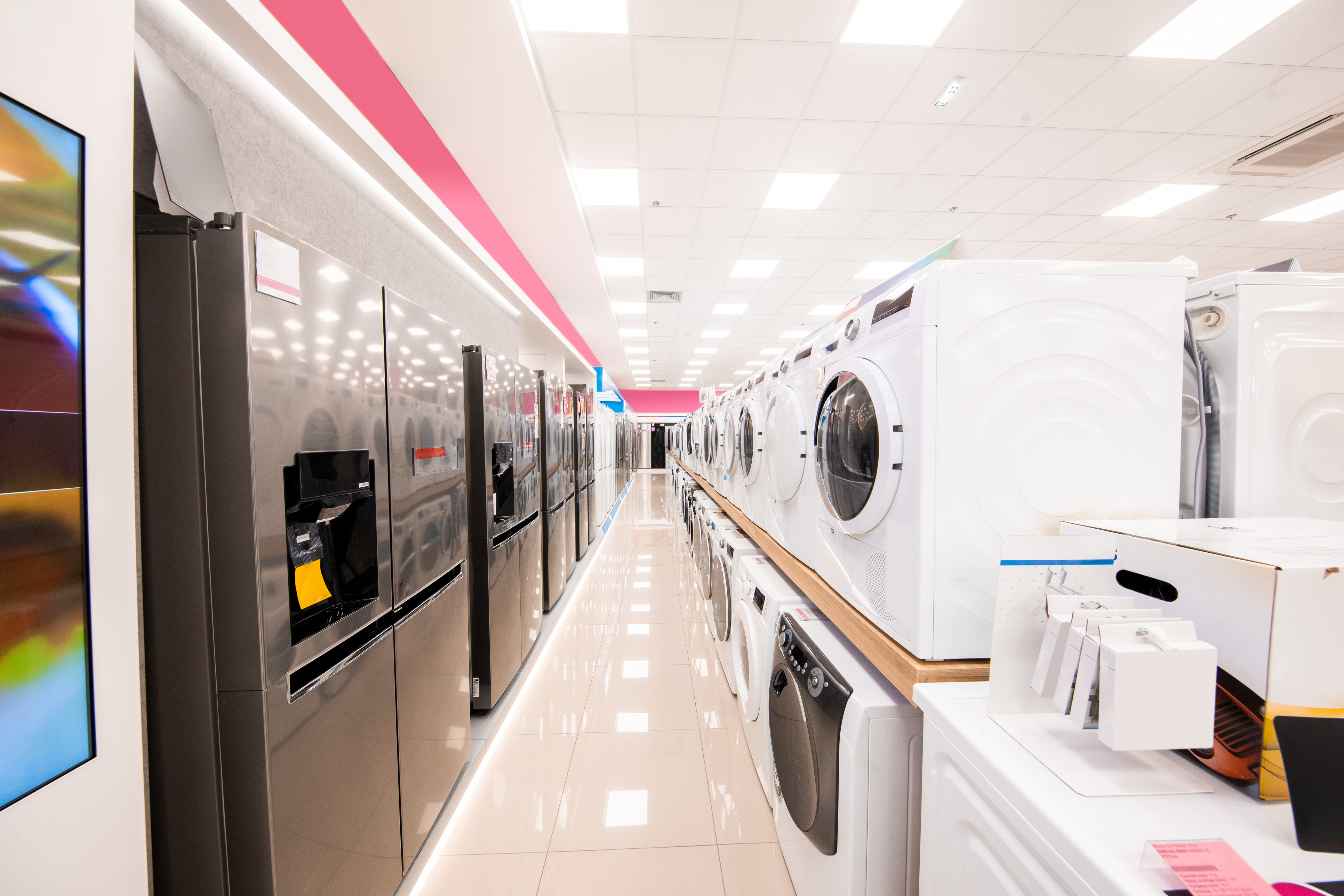 Refrigerators and washers in an appliance store 