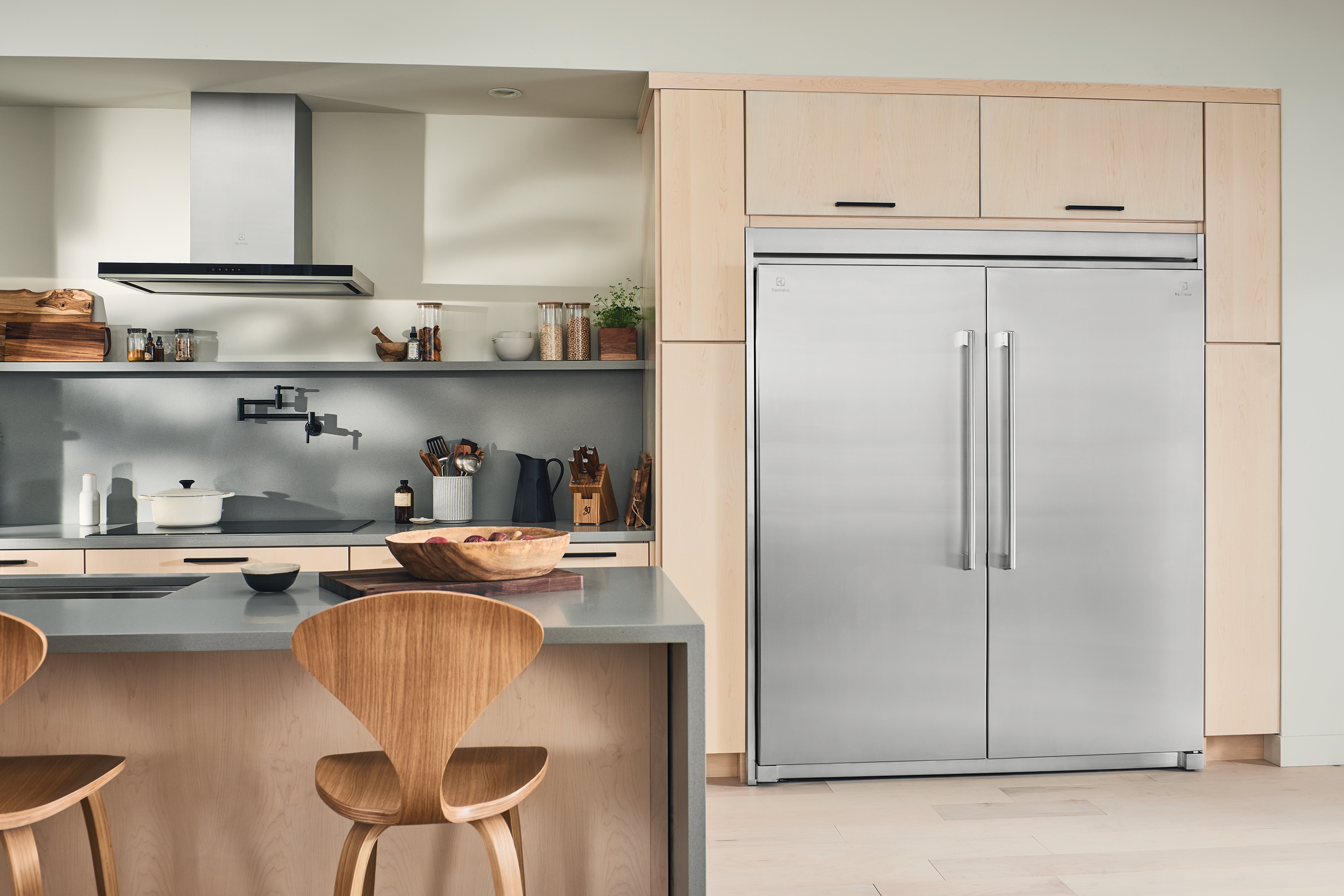 A Frigidaire Professional all freezer and all refrigerator column in a kitchen