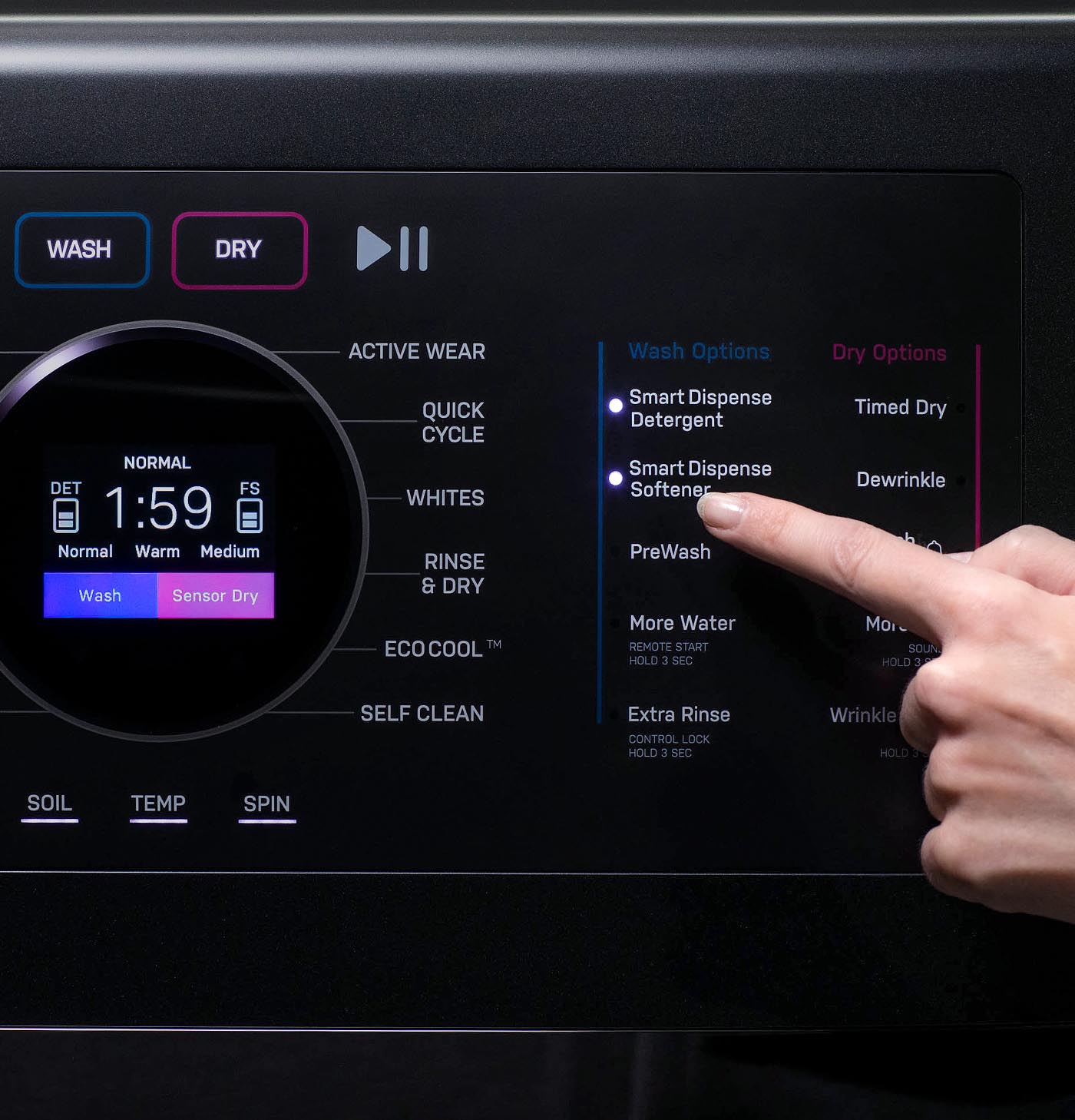 A person selecting a wash setting on the GE Profile UltraFast washer dryer 