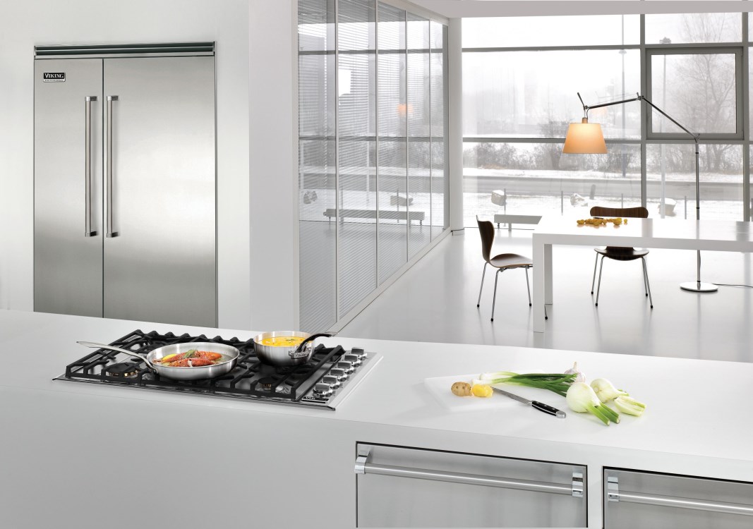 bare minimalist kitchen with Viking gas cooktop