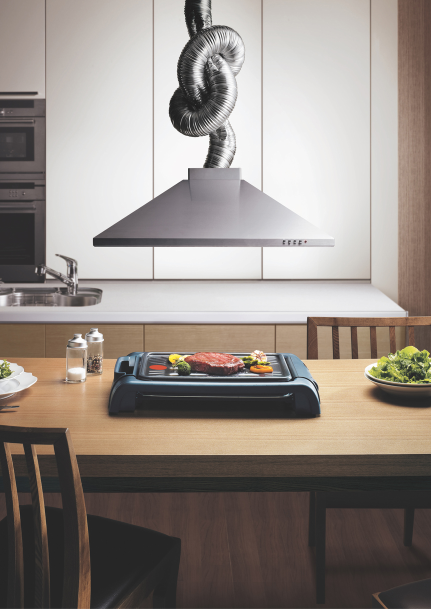 humorous take on an Island range hood with twisted ductwork over an indoor smokeless grill