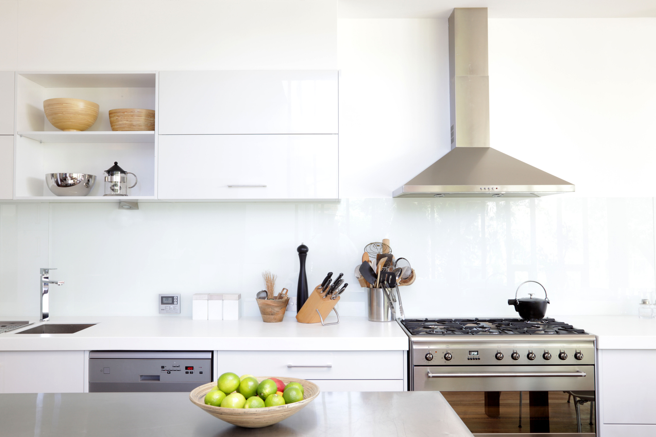 kitchen with wall-mount range hood style