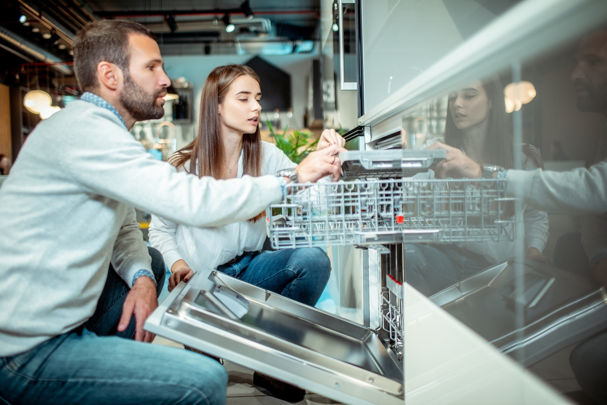 couple shopping for a new dishwasher
