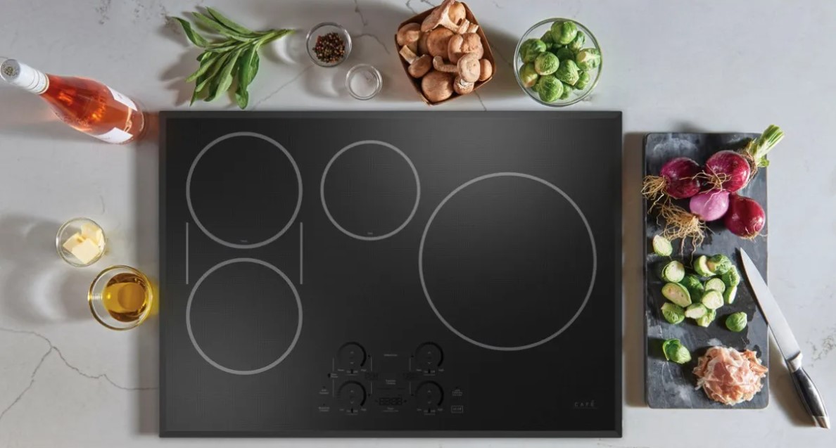 flagstone grey induction cooktop in a marble kitchen