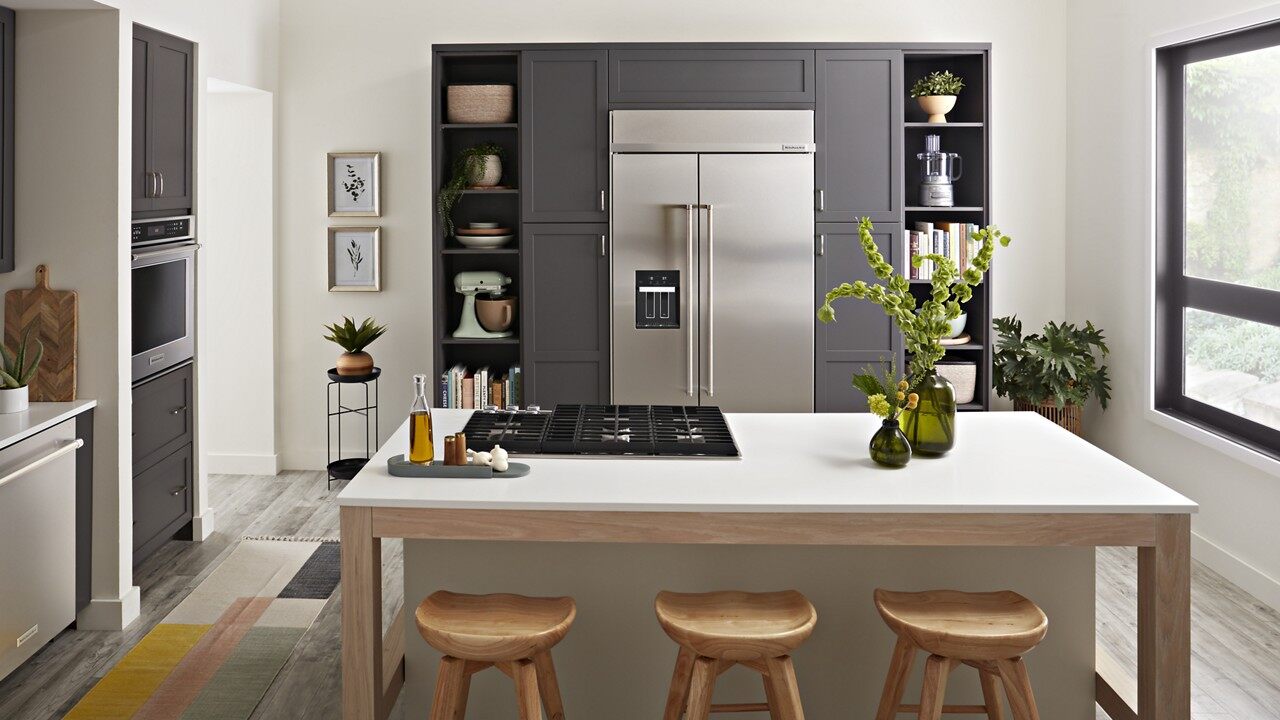 The KitchenAid kbsd702mps side by side refrigerator in a modern kitchen 