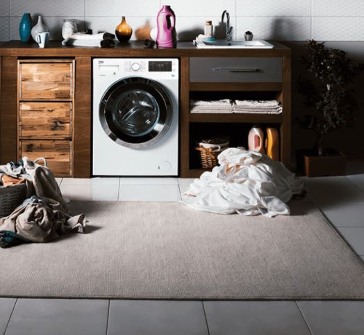 small washer and dryer laundry room