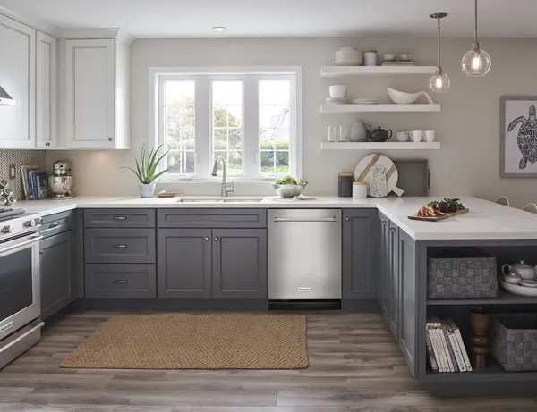The KitchenAid KDTM604KPS dishwasher featured in a kitchen 