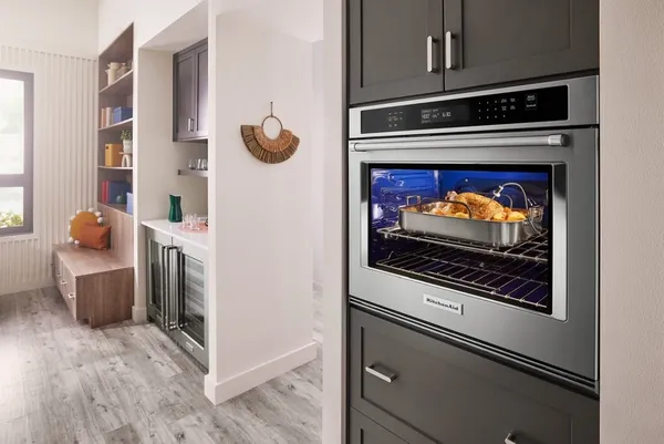 The KitchenAid KOES527PSS wall oven in a kitchen 