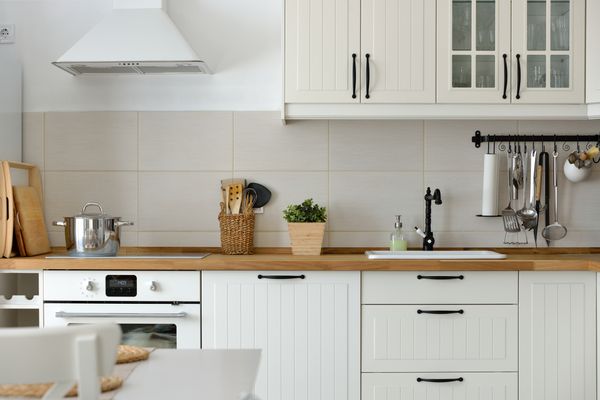 A kitchen featuring panel ready appliances 