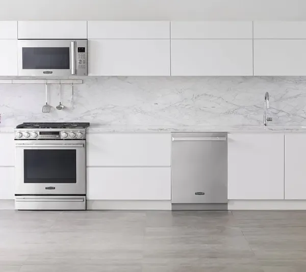A kitchen featuring Signature Kitchen Suite appliances 