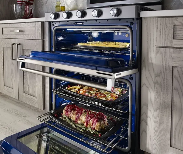 The KitchenAid KFGD500ESS double oven range featuring a variety of entrées 