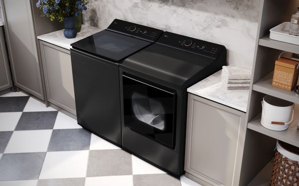 A matching LG front load washer and dryer in a laundry room 