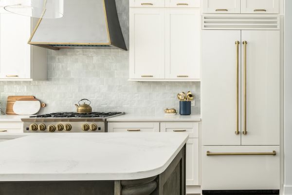 A kitchen featuring white appliances 