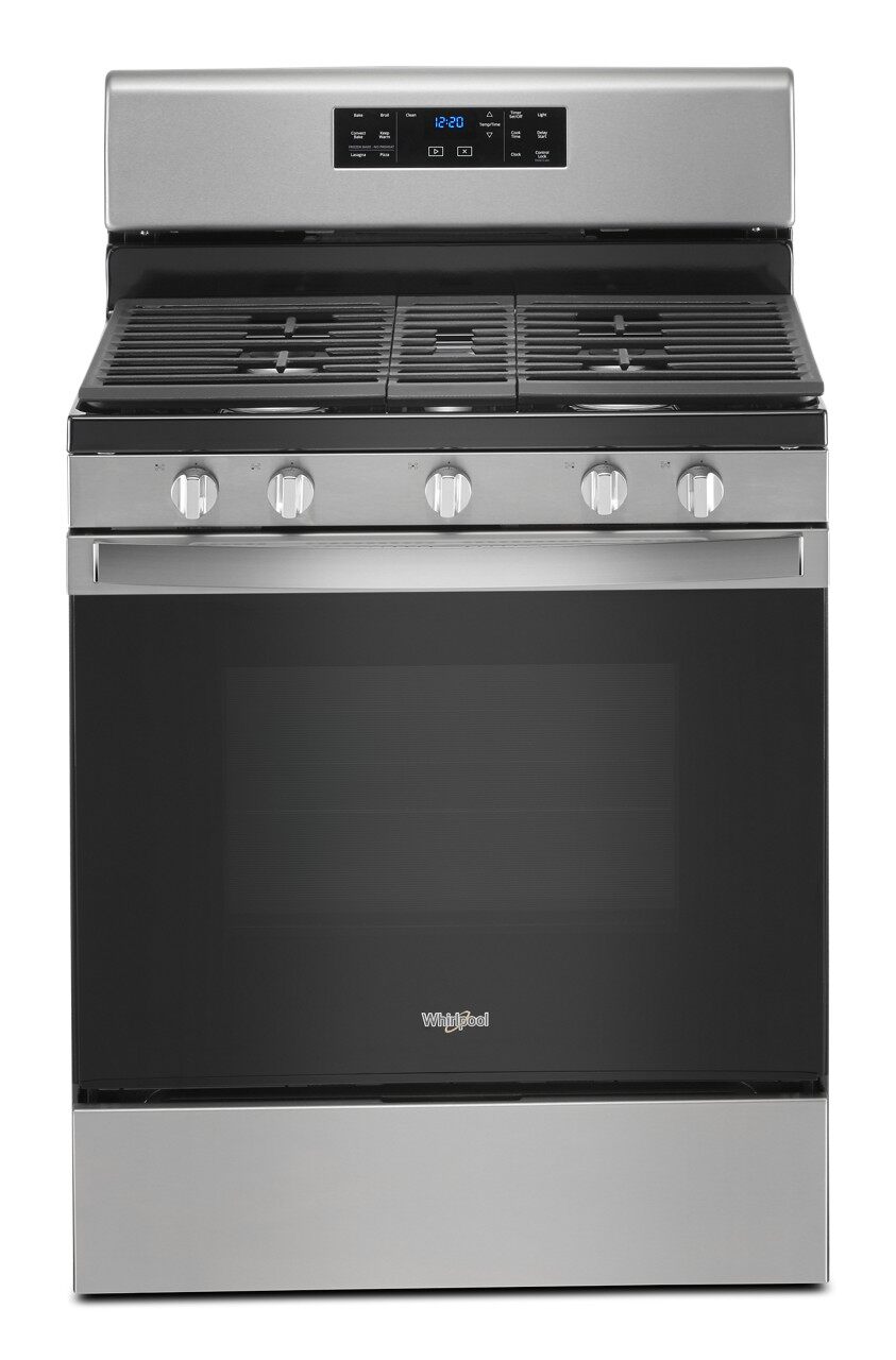 range with cast iron grate grid on burners