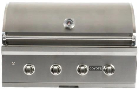 Stock photo of a stainless steel built in Coyote grill.