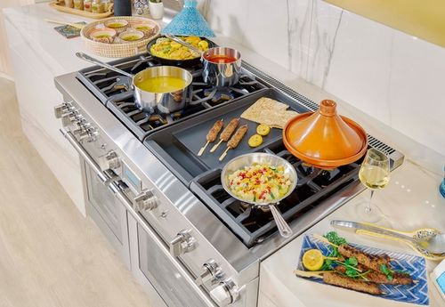 High End Stove With Many Dishes