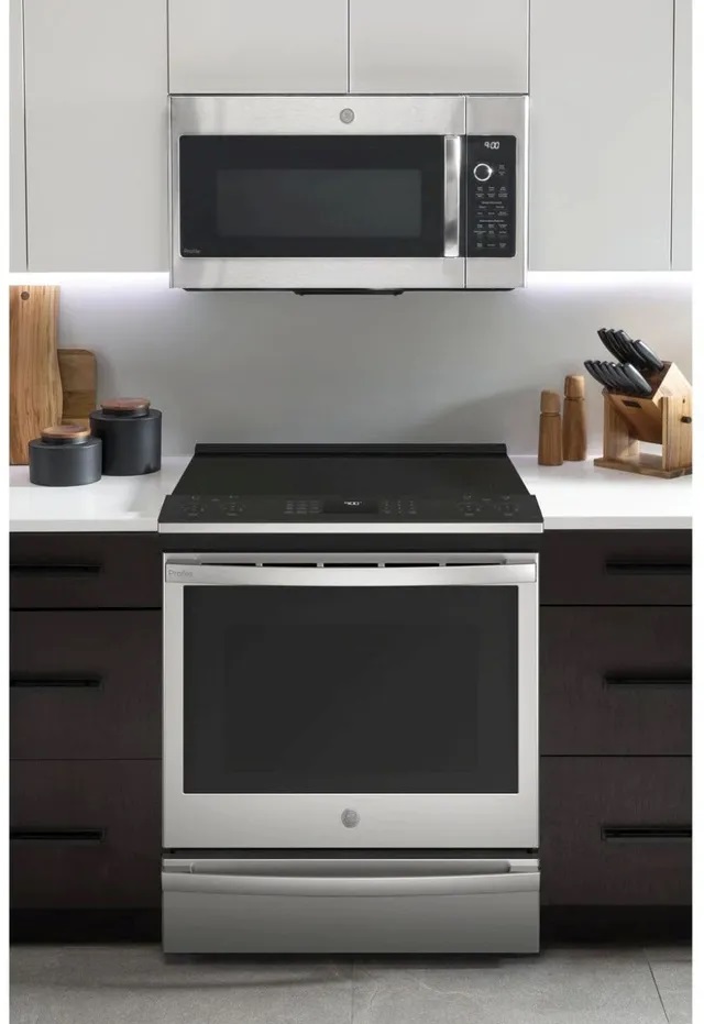 closeup of induction range and overhead microwave