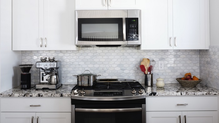 The interior of a modern kitchen focused on appliances.