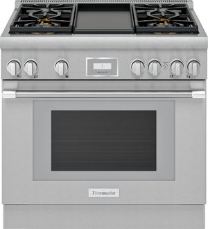 Stainless steel Thermador brand range with large handle and frontal digital controls.