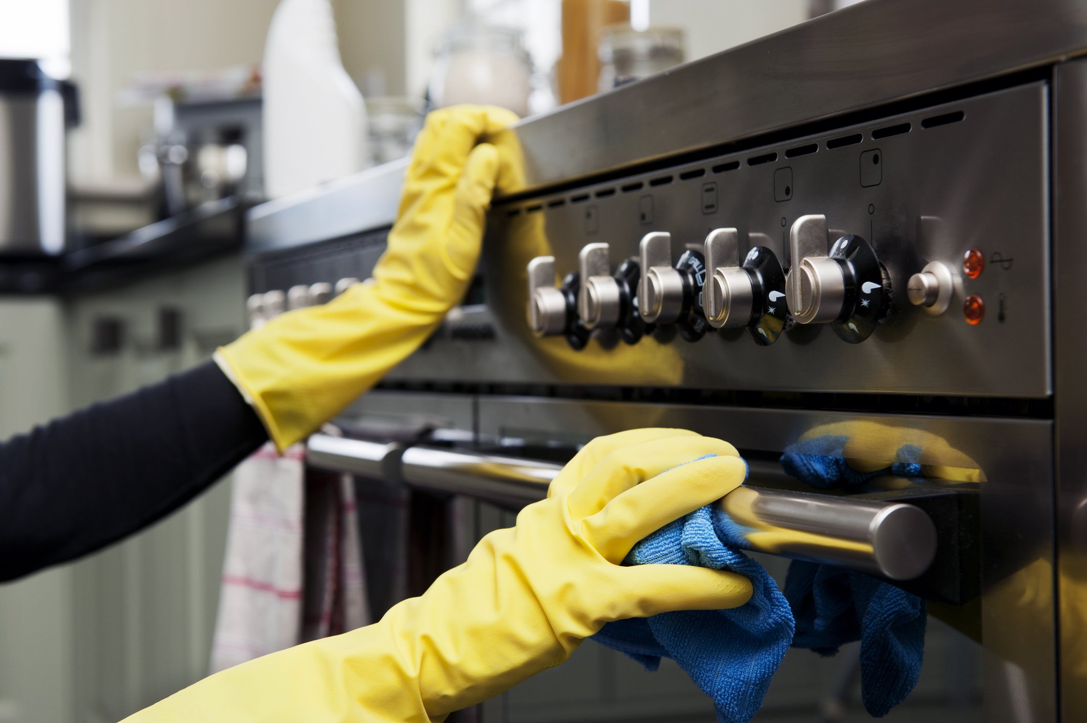 wiping down stainless steel range