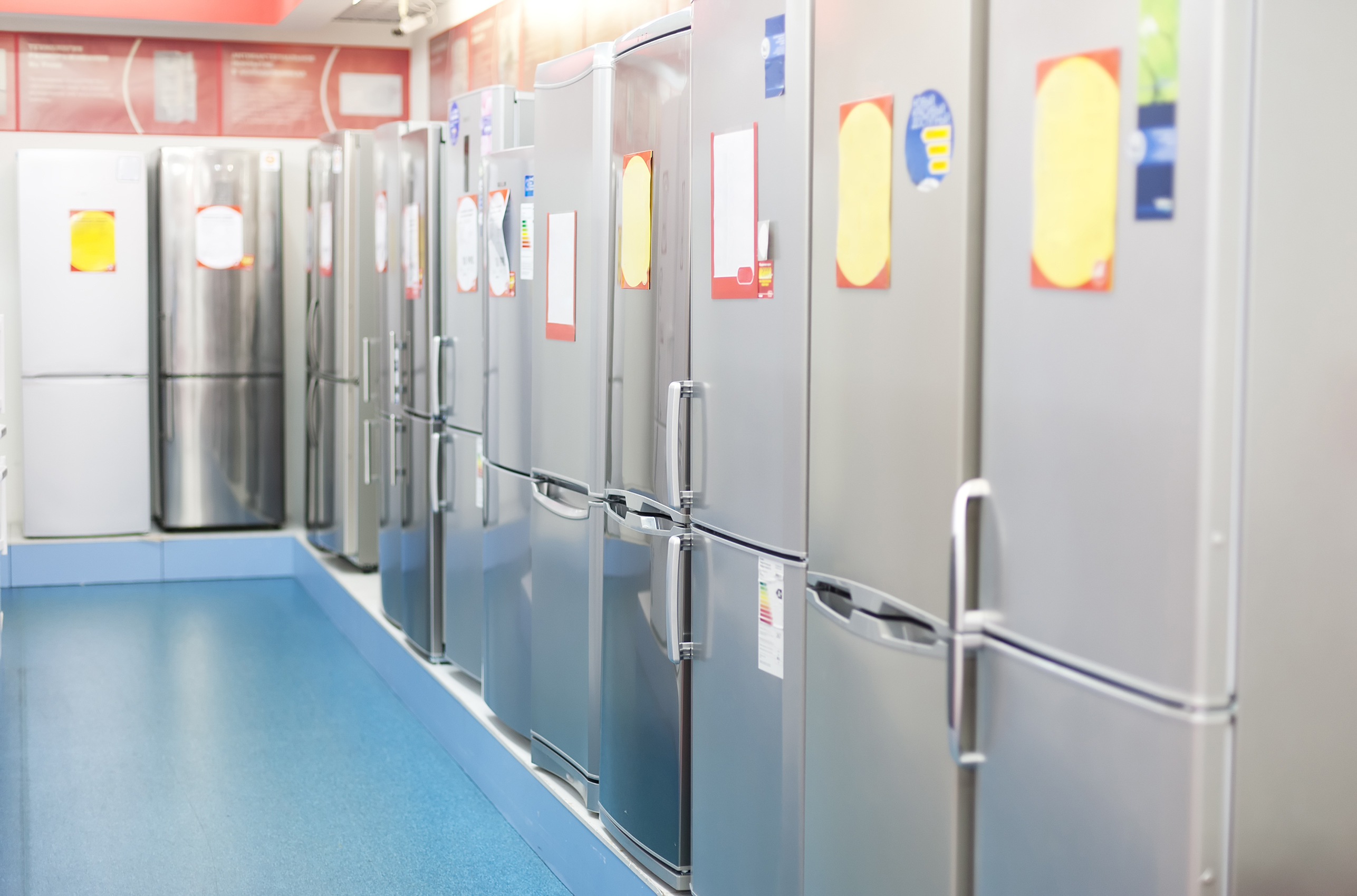 Several refrigerators with sales tickets 