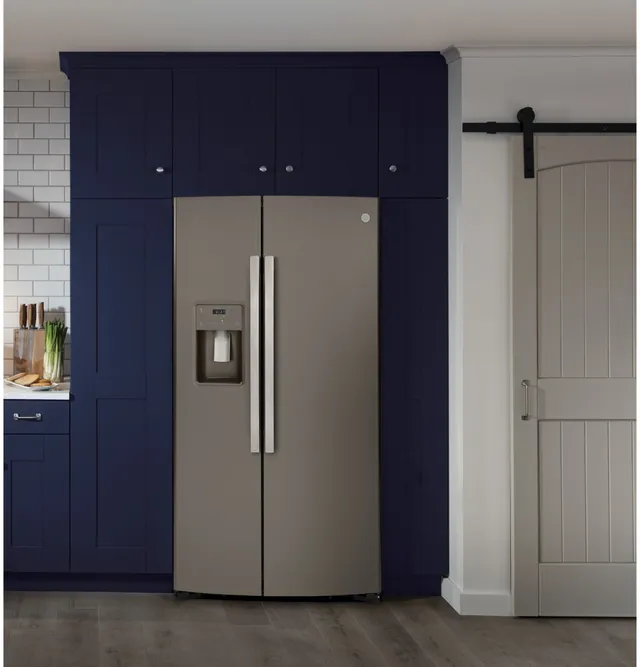 A GE side by side refrigerator installed in a kitchen