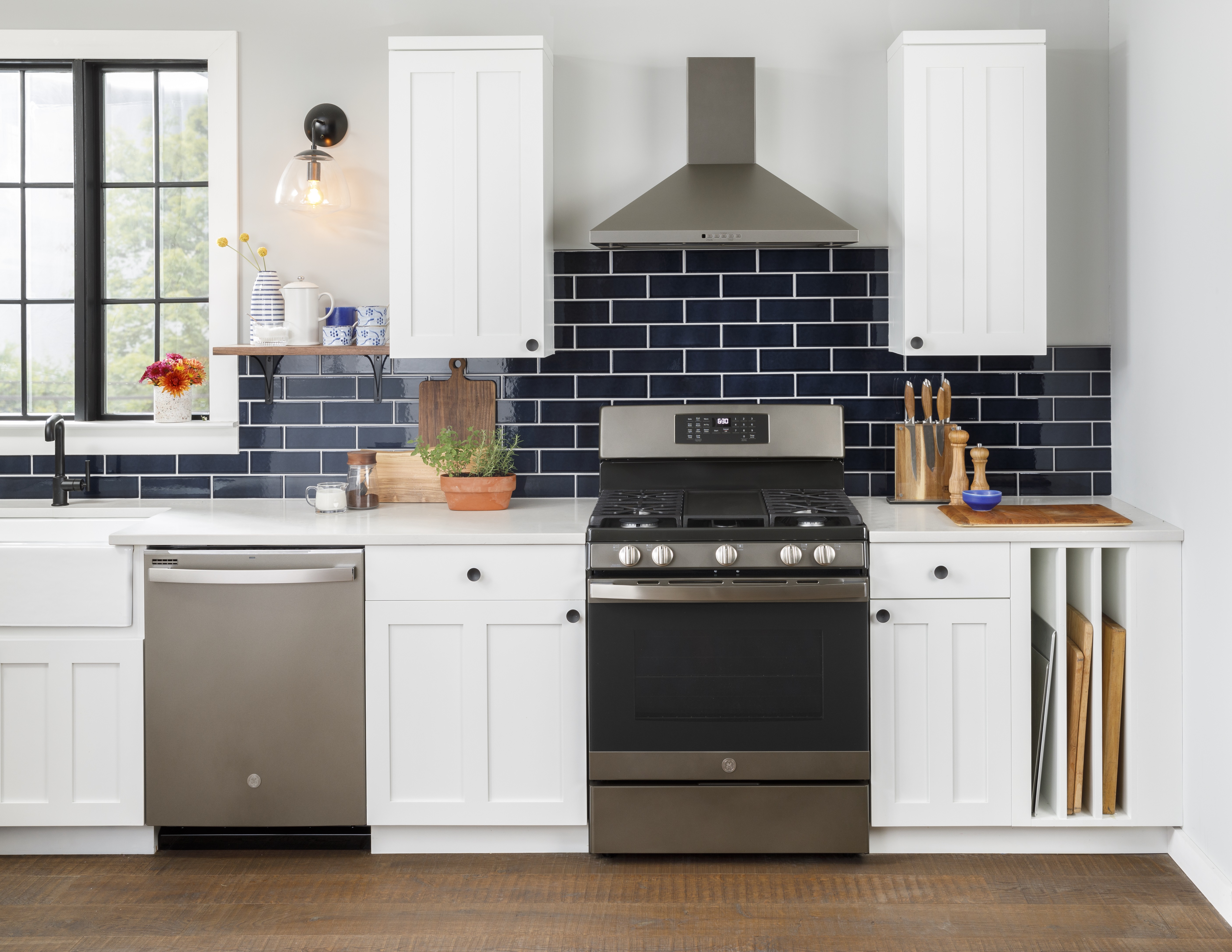 A kitchen featuring a GE range and dishwasher 