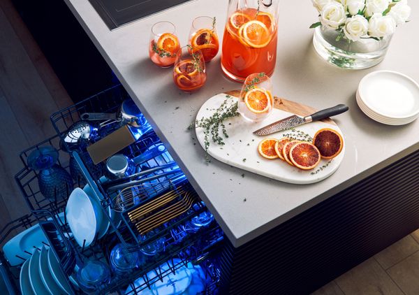 luxurious Thermador dishwasher with blue interior lighting